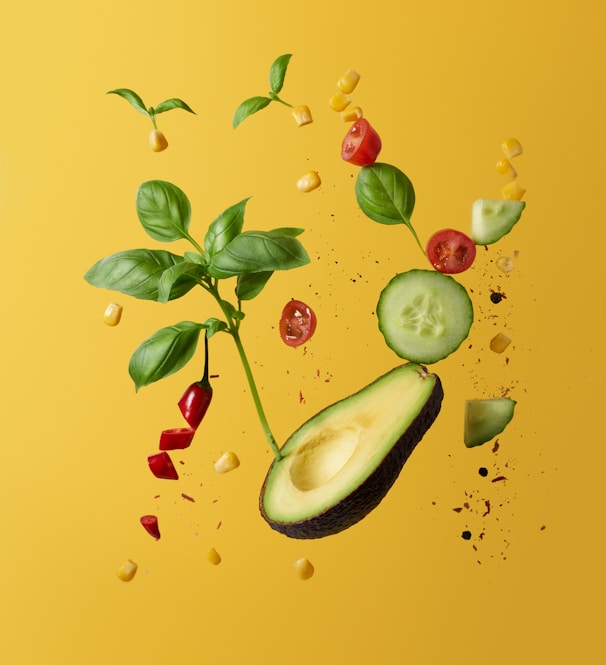 green and red fruit with green leaves