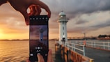 Close-up of Lighthouse Hub mobile app on a smartphone screen