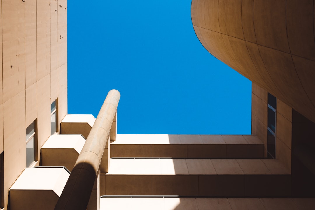 white concrete building under blue sky during daytime