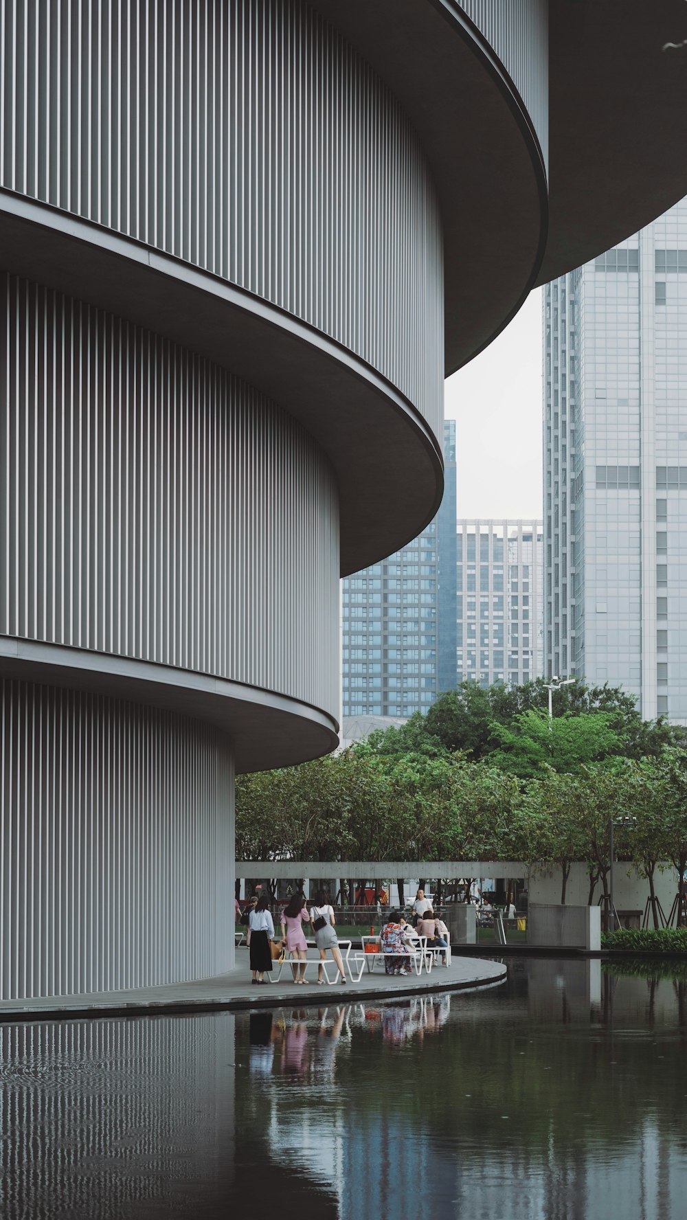 people walking on street near high rise building during daytime