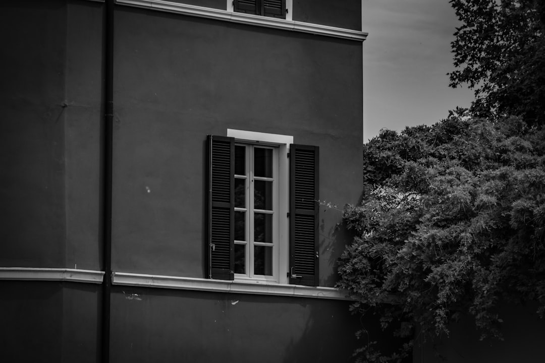 grayscale photo of concrete building