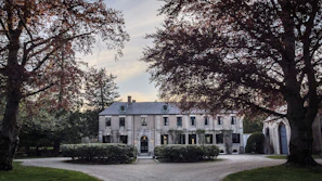 Real estate property with landscaped garden and a welcoming entrance