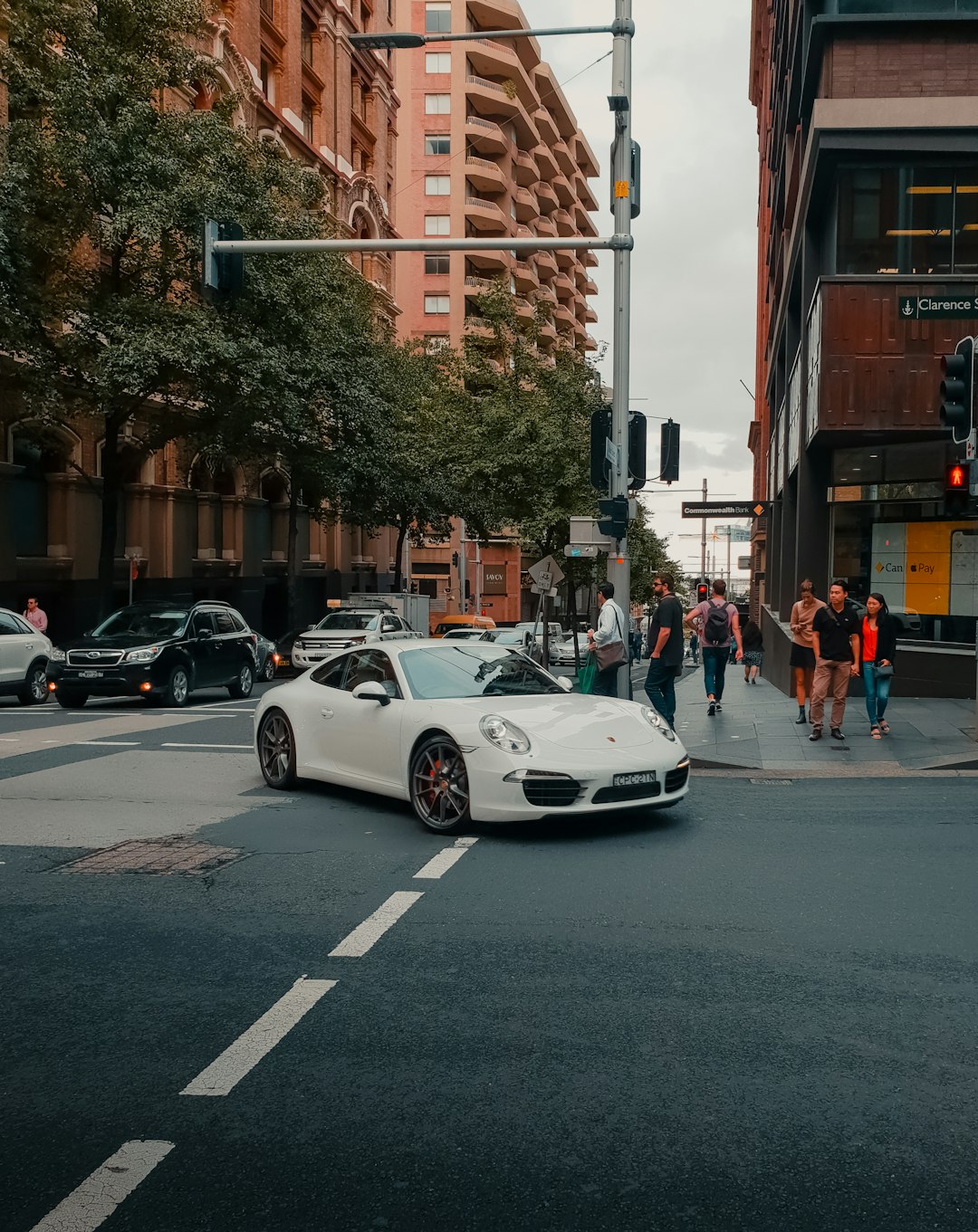 white porsche 911 on road during daytime