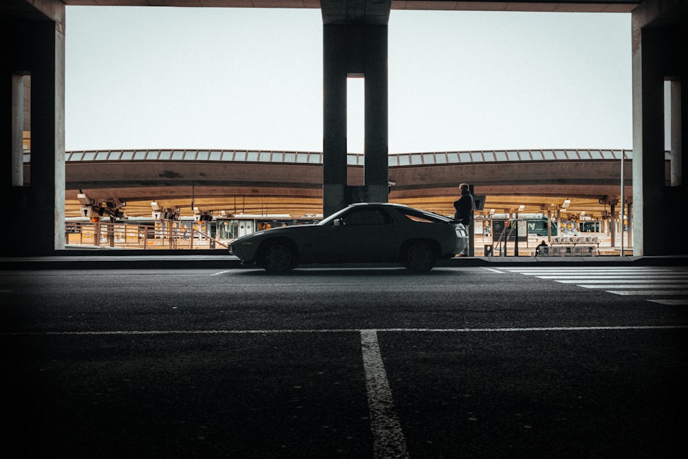 black coupe on road during daytime