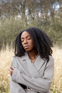 woman in black and white striped button up shirt