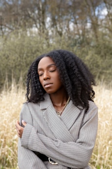 woman in black and white striped button up shirt
