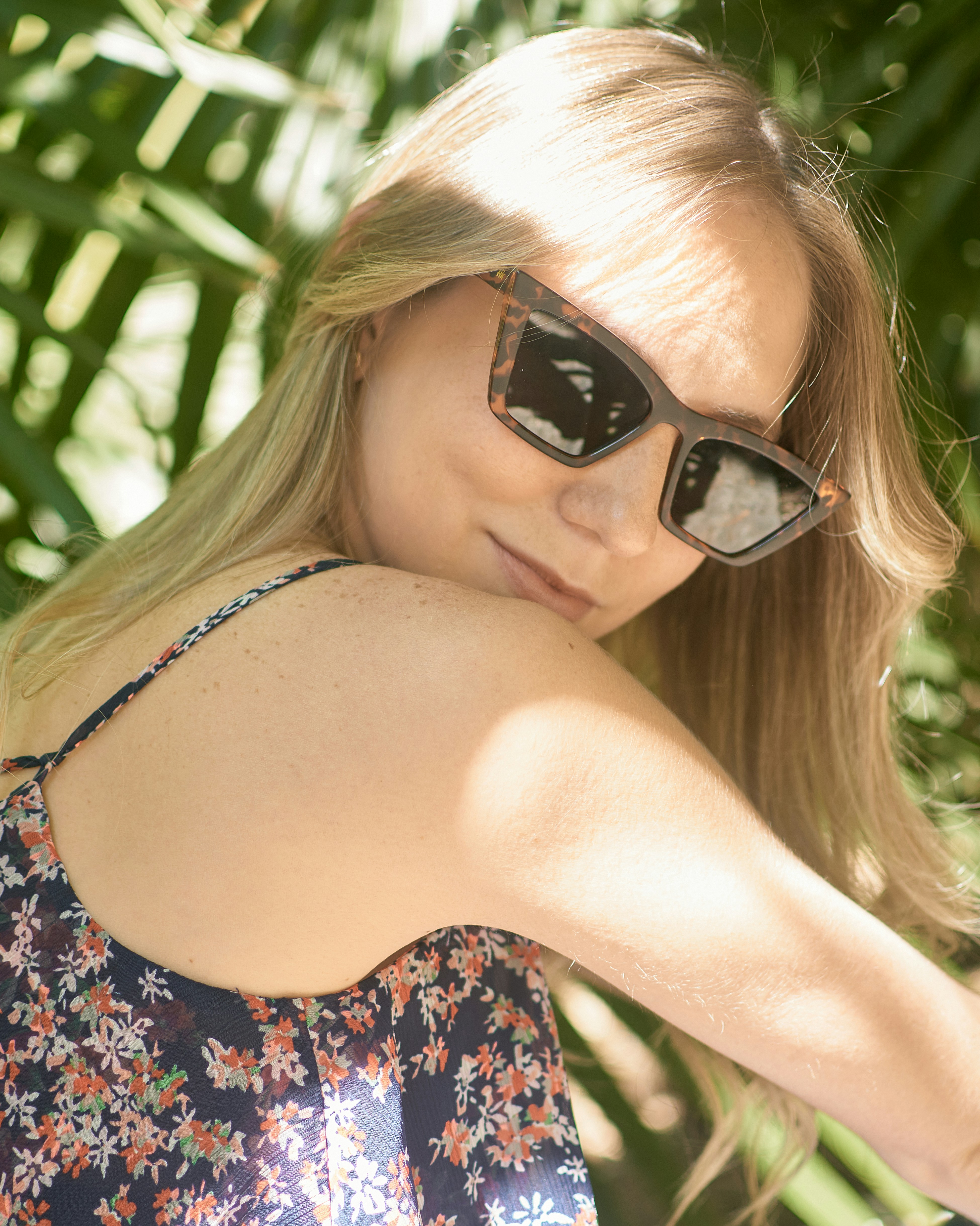 woman in black framed sunglasses