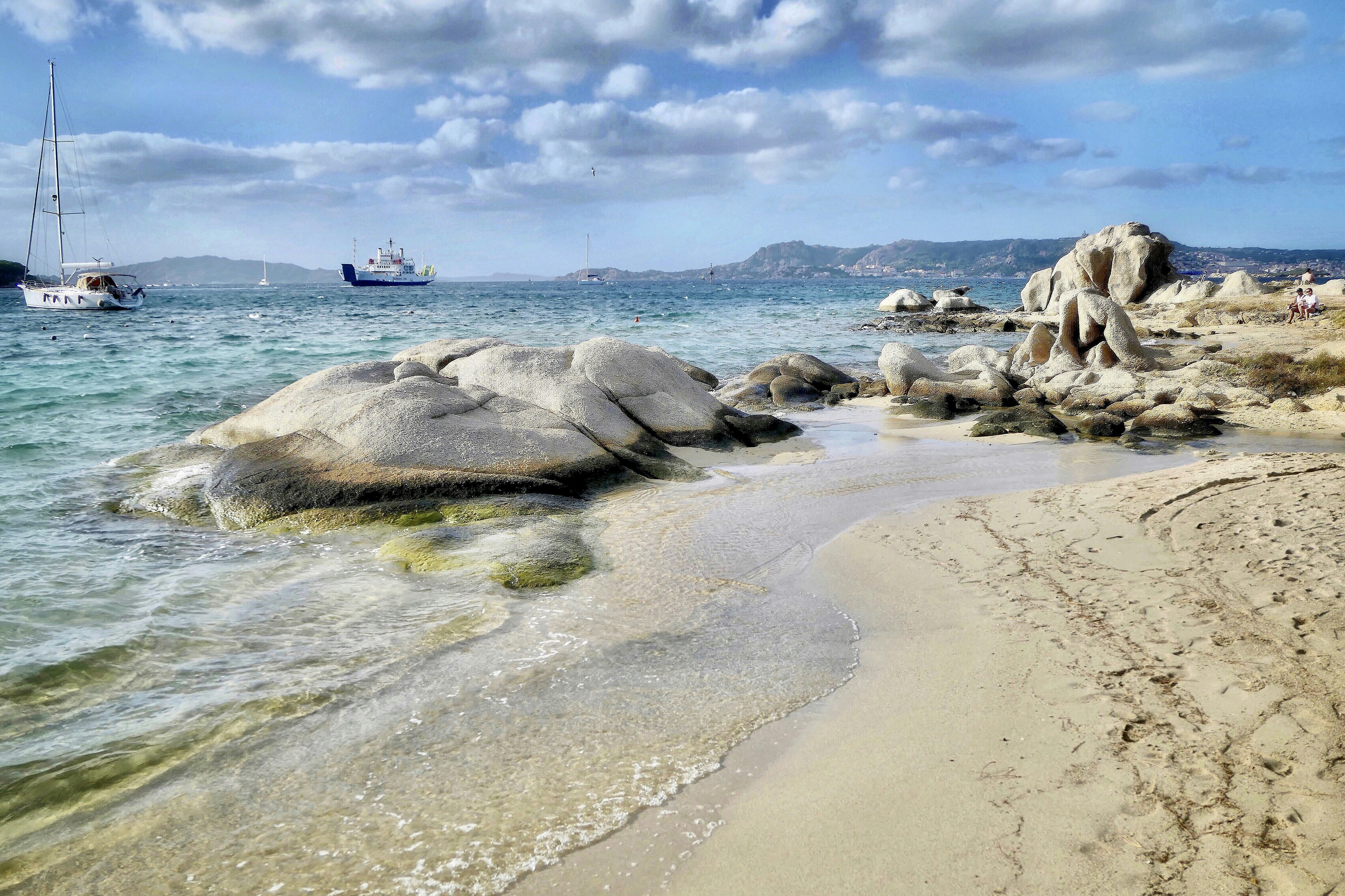 gray rock formation on sea shore during daytime