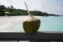 coconut fruit on brown wooden table