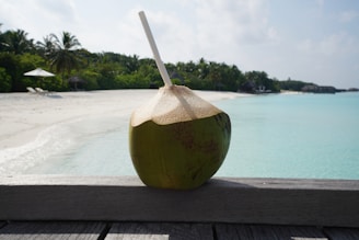 coconut fruit on brown wooden table
