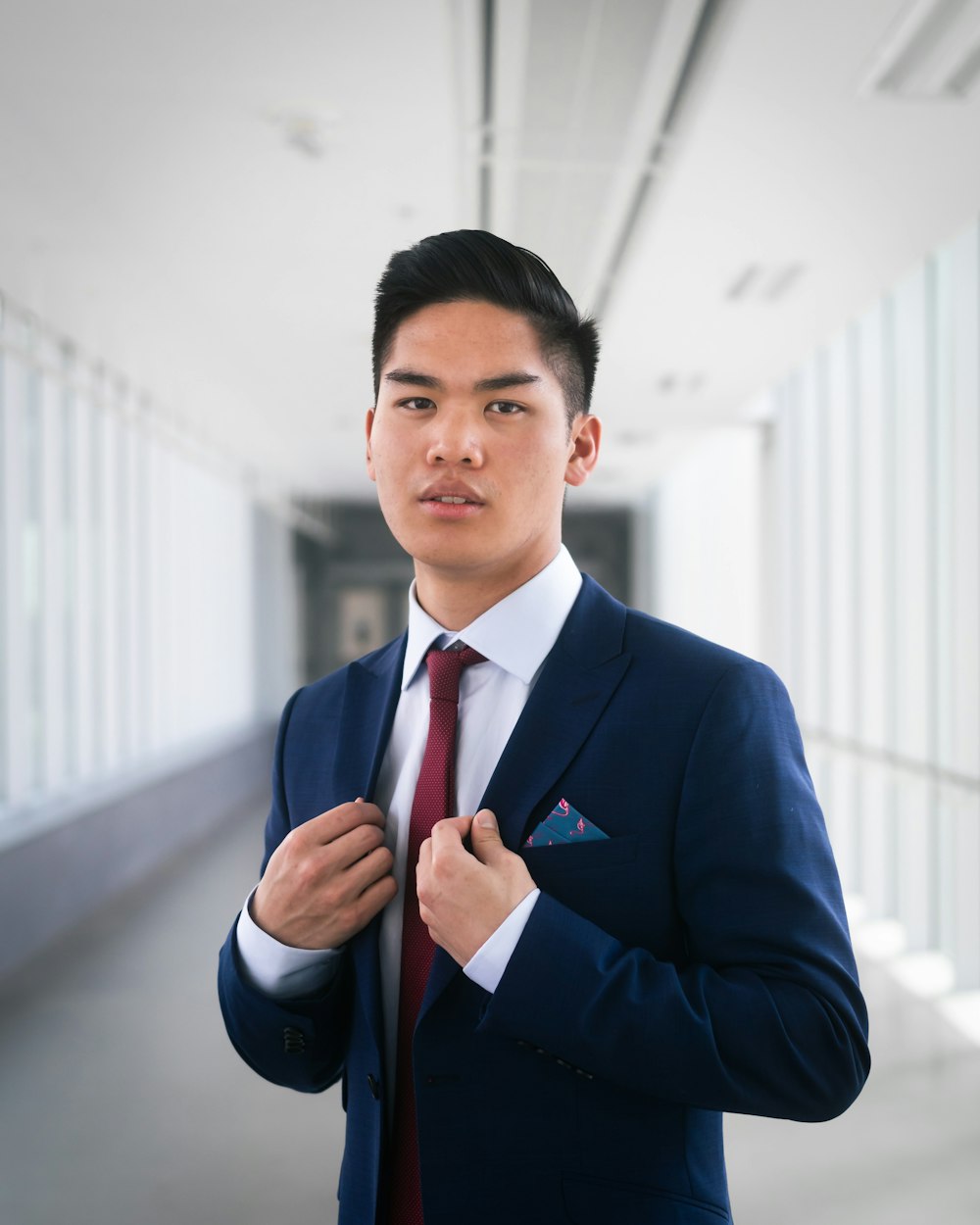 man in blue suit jacket