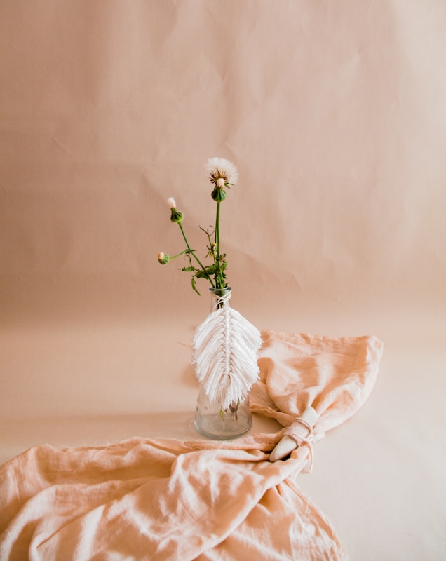 white flower on white textile