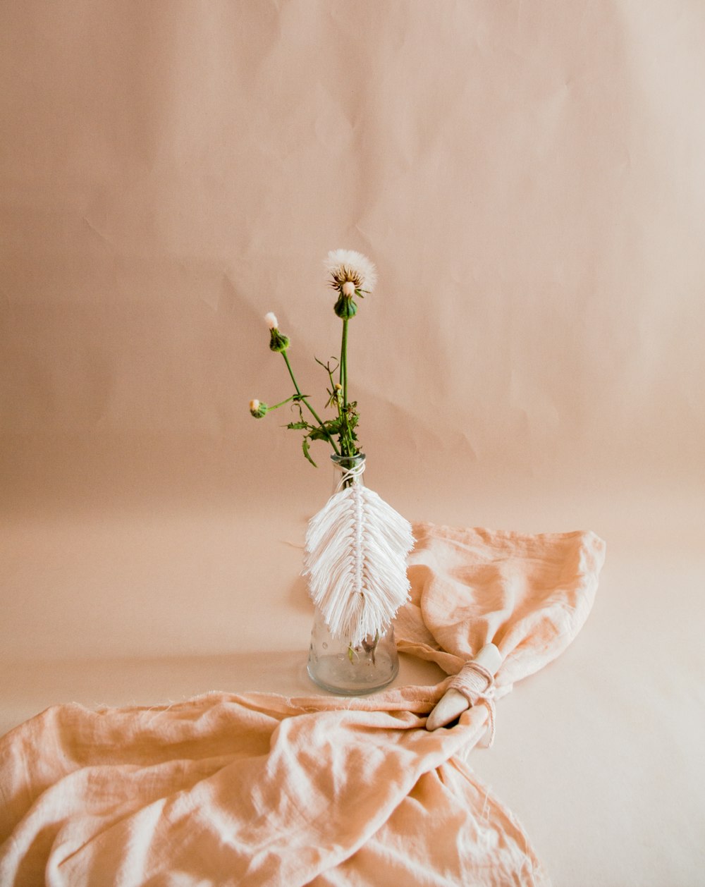 white flower on white textile