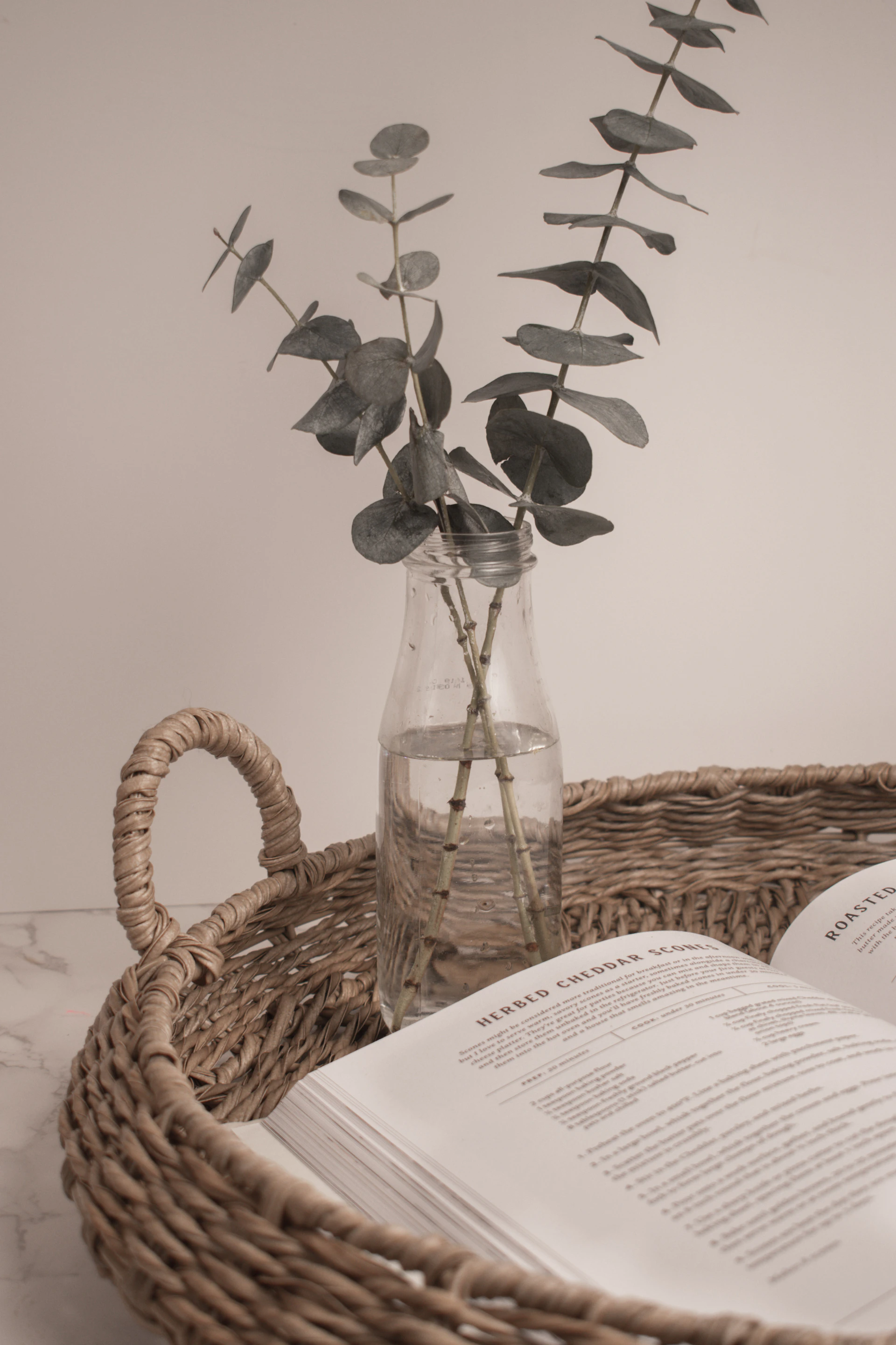 white printer paper on brown woven basket