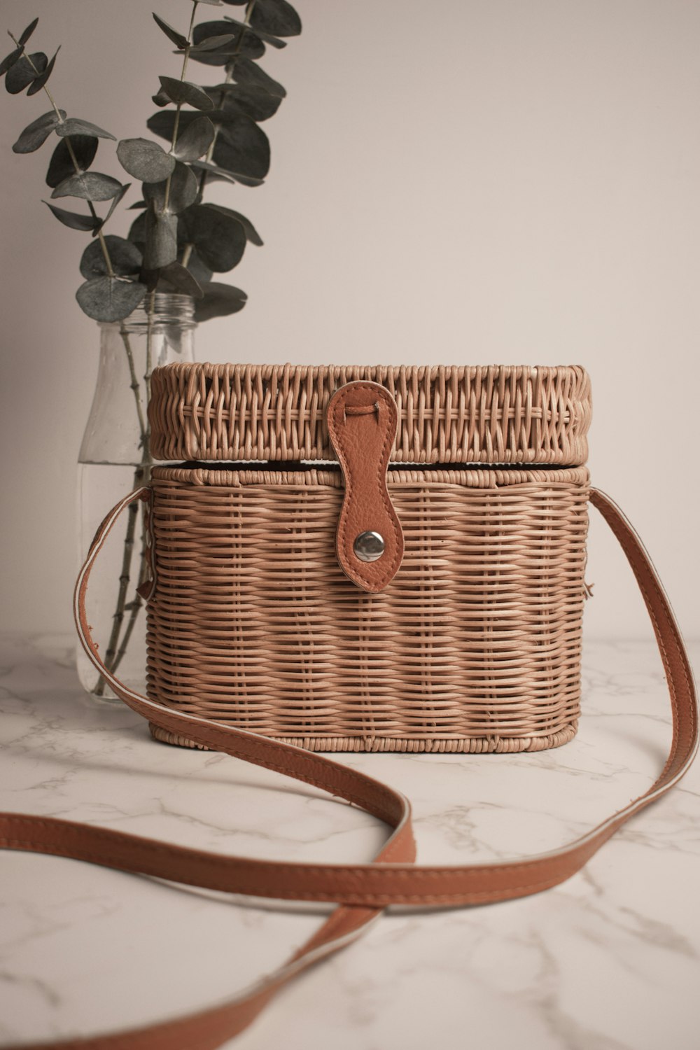 brown woven basket on brown wooden table