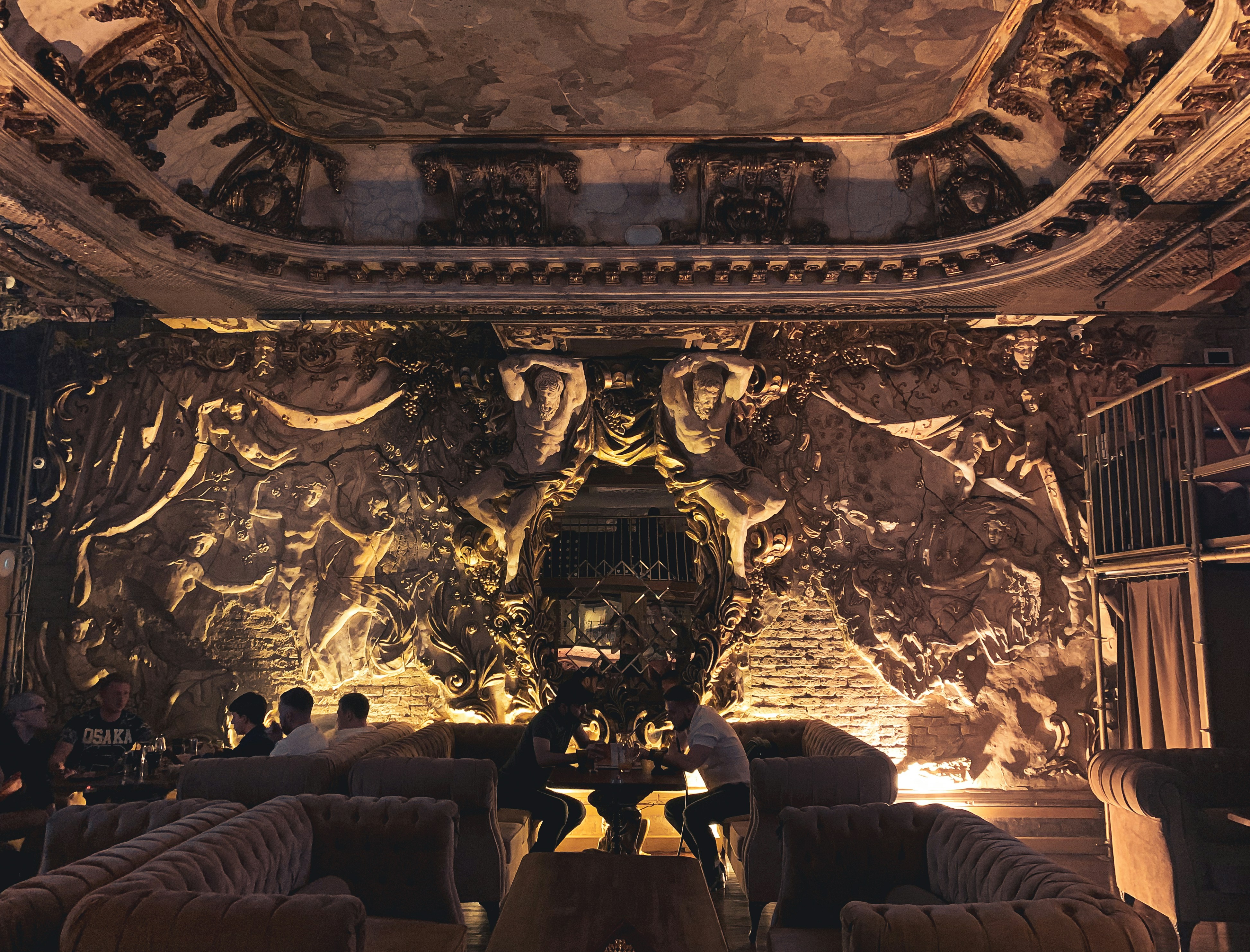 Khedive's Royal Engine cab interior, leather sofas and brass fittings visible, warm amber light, ornate details