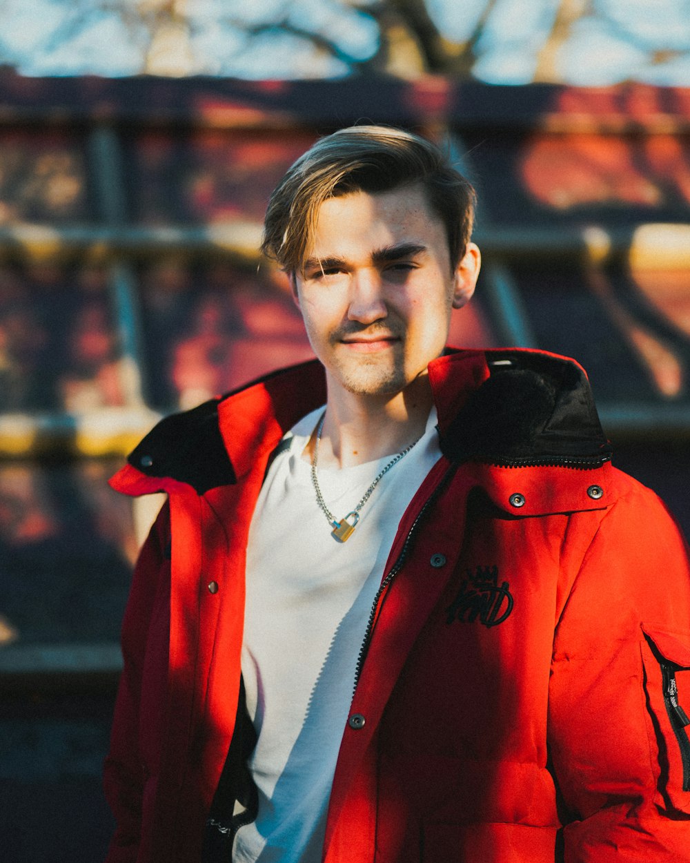 woman in red coat smiling