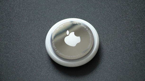 white round plastic lid on black surface