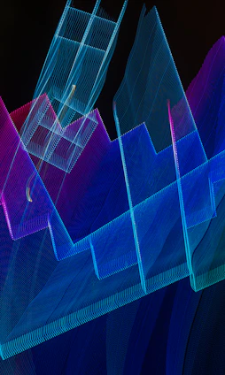Abstract geometric shapes interlaced with circuit patterns glowing softly against a deep navy background.