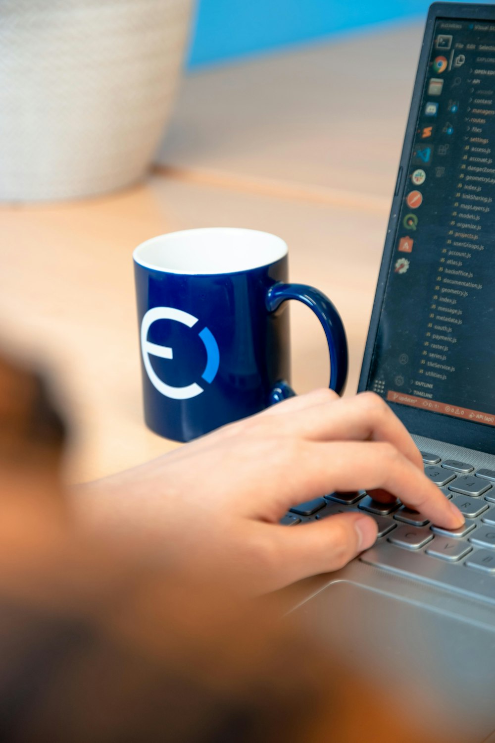 person using black laptop computer