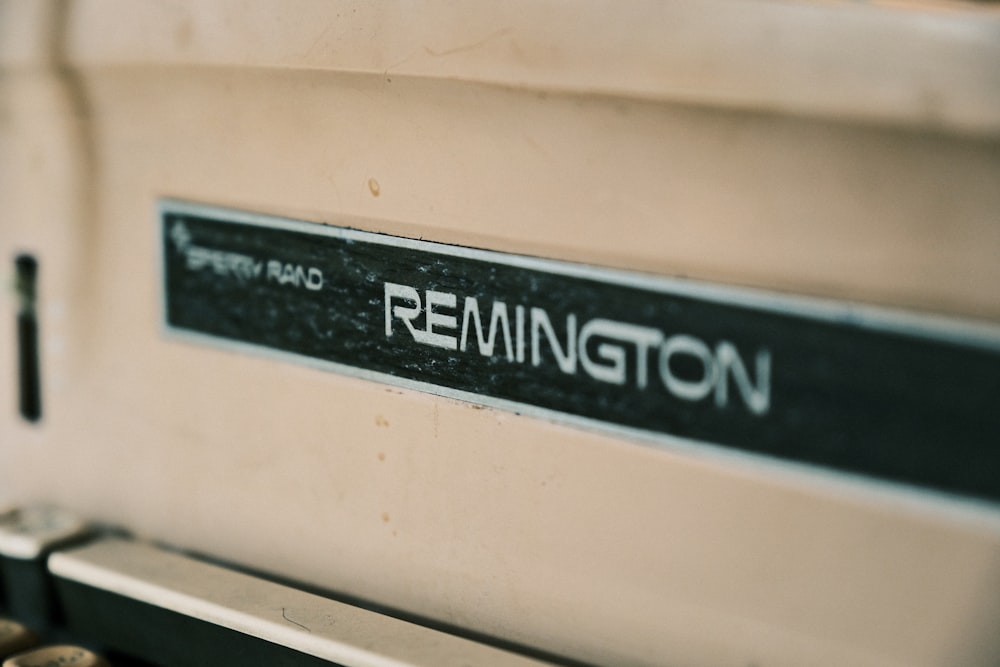 a close up of a typewriter with the words remington on it