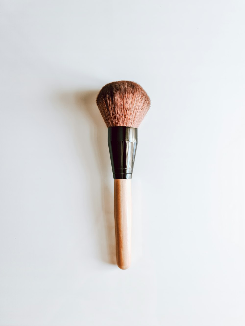 brown and silver makeup brush