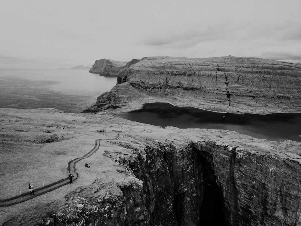 grayscale photo of rocky mountain