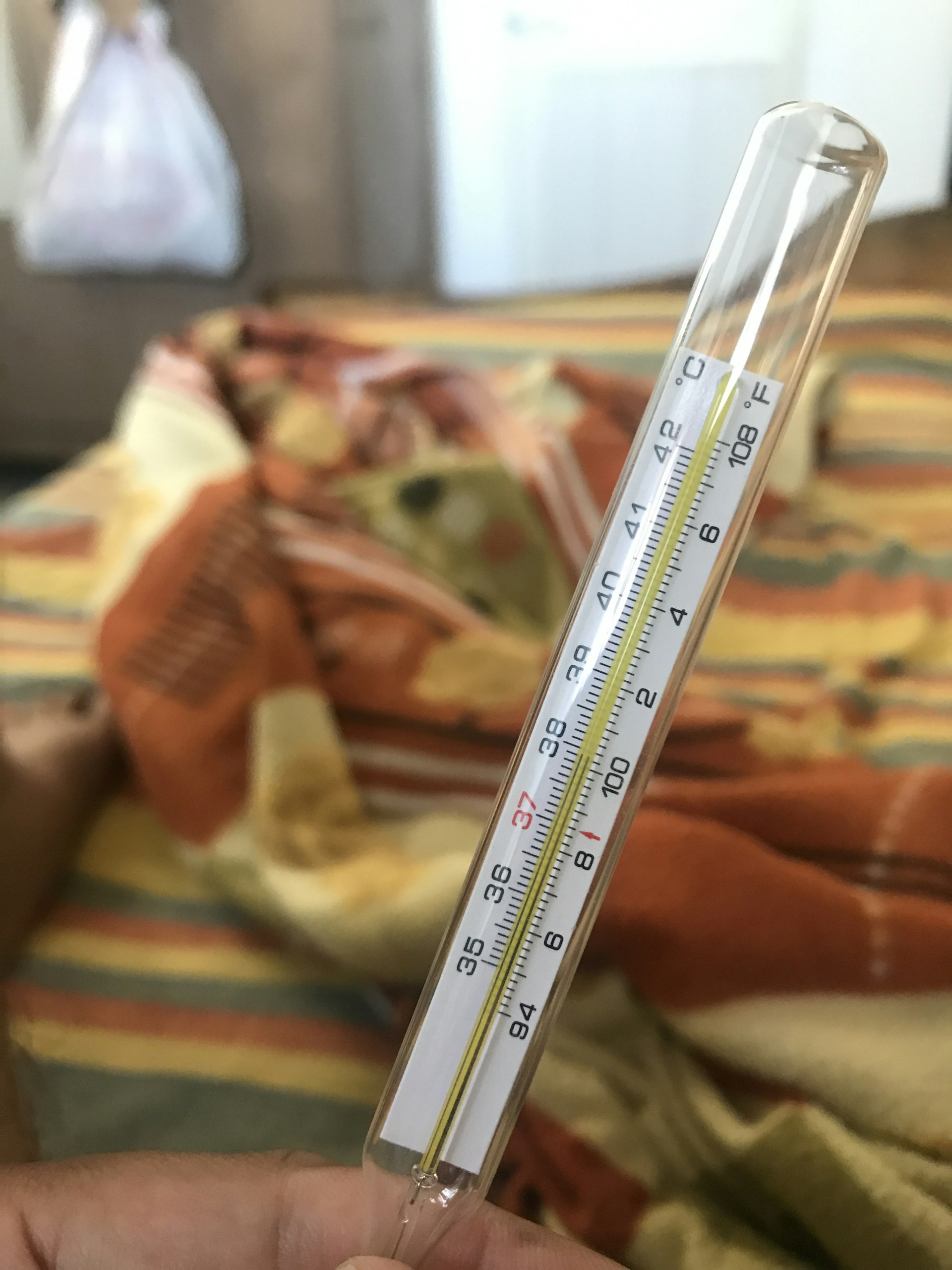 white thermometer at 36 7