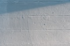 white concrete wall during daytime