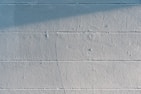 white concrete wall during daytime