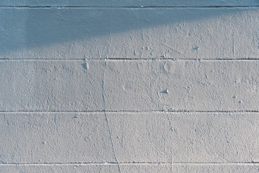 white concrete wall during daytime