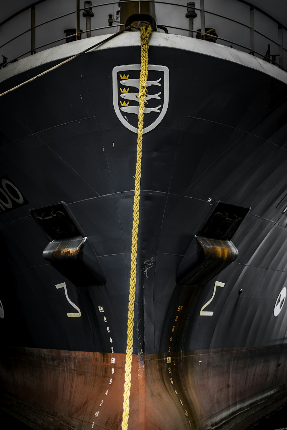 black and white ship on sea during daytime