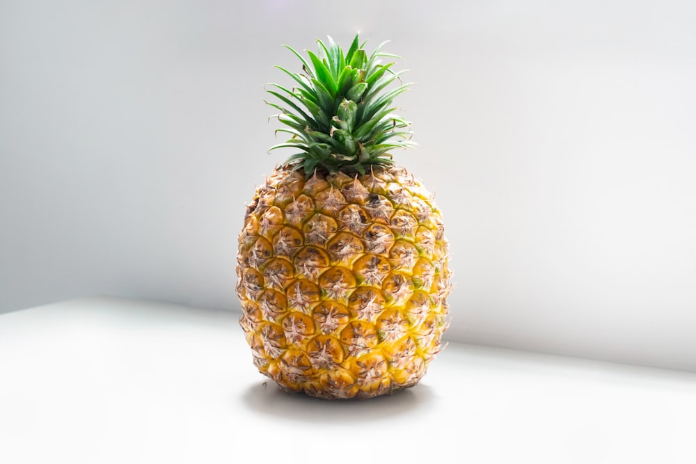 pineapple fruit on white table