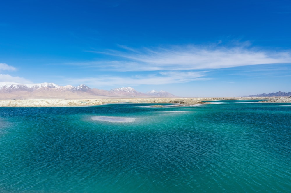 blue sea under blue sky during daytime