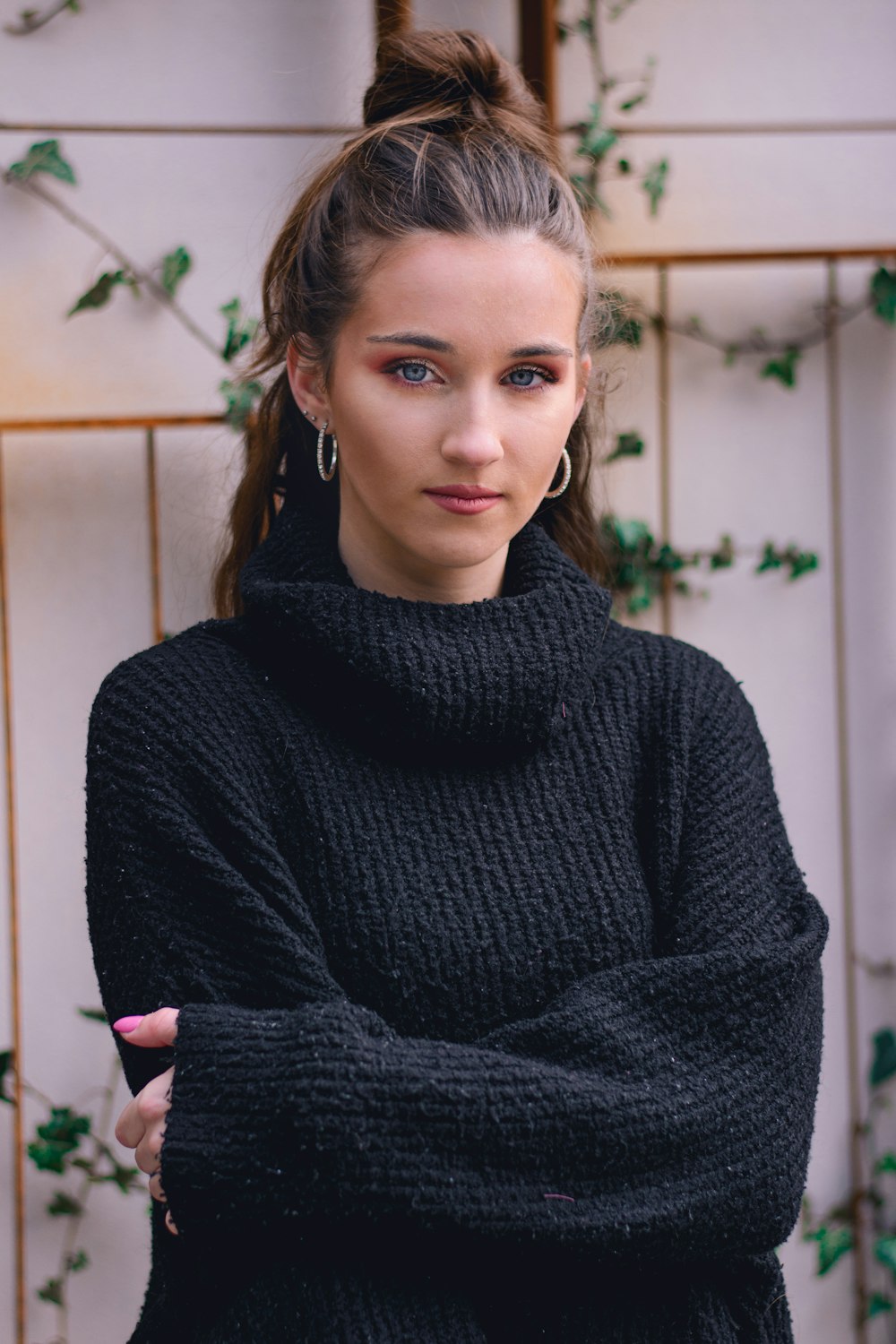 woman in black knit sweater