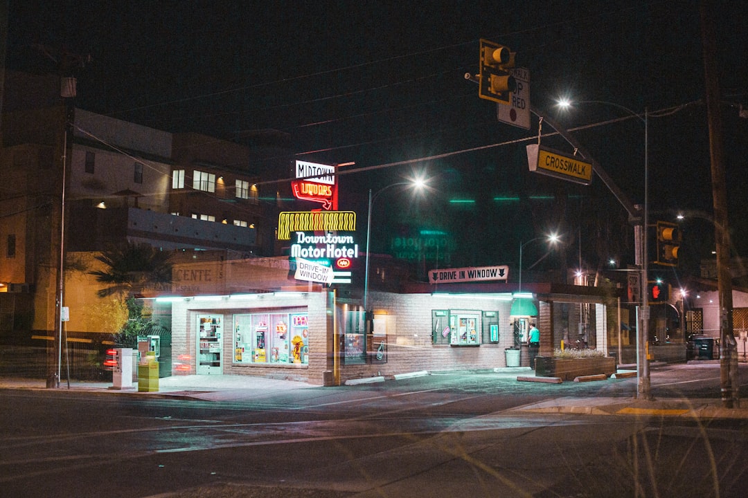 white and red store front during night time