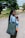 woman in black framed eyeglasses and black long sleeve dress