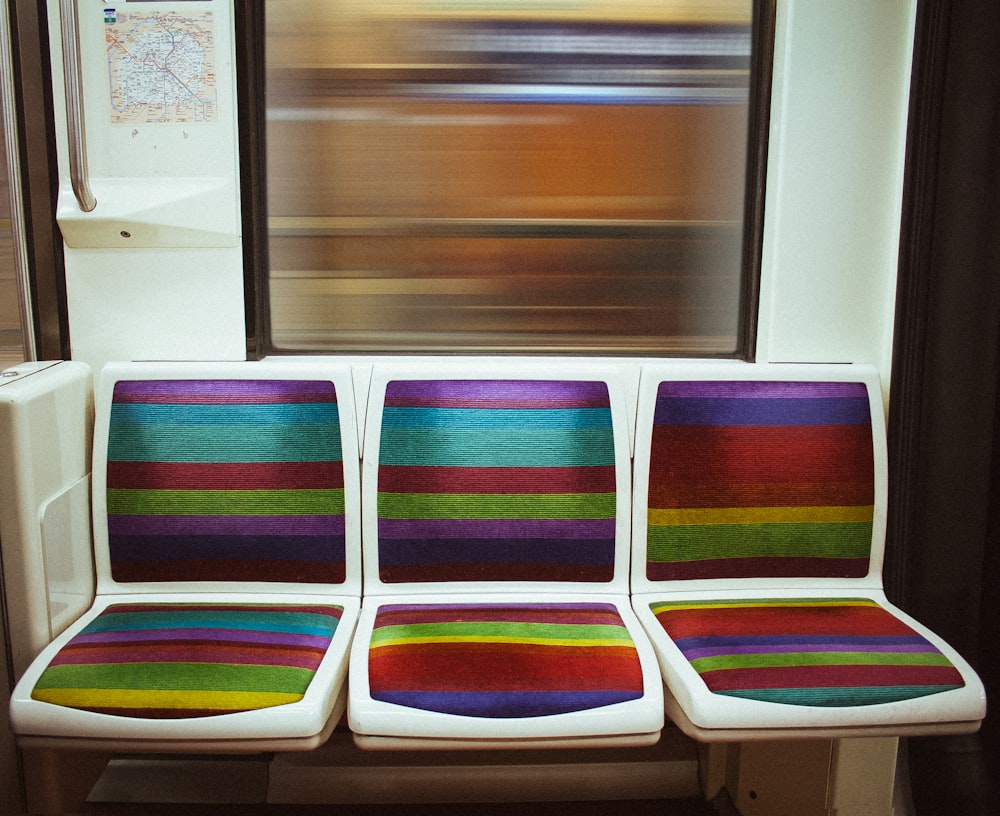 white and purple plastic chairs