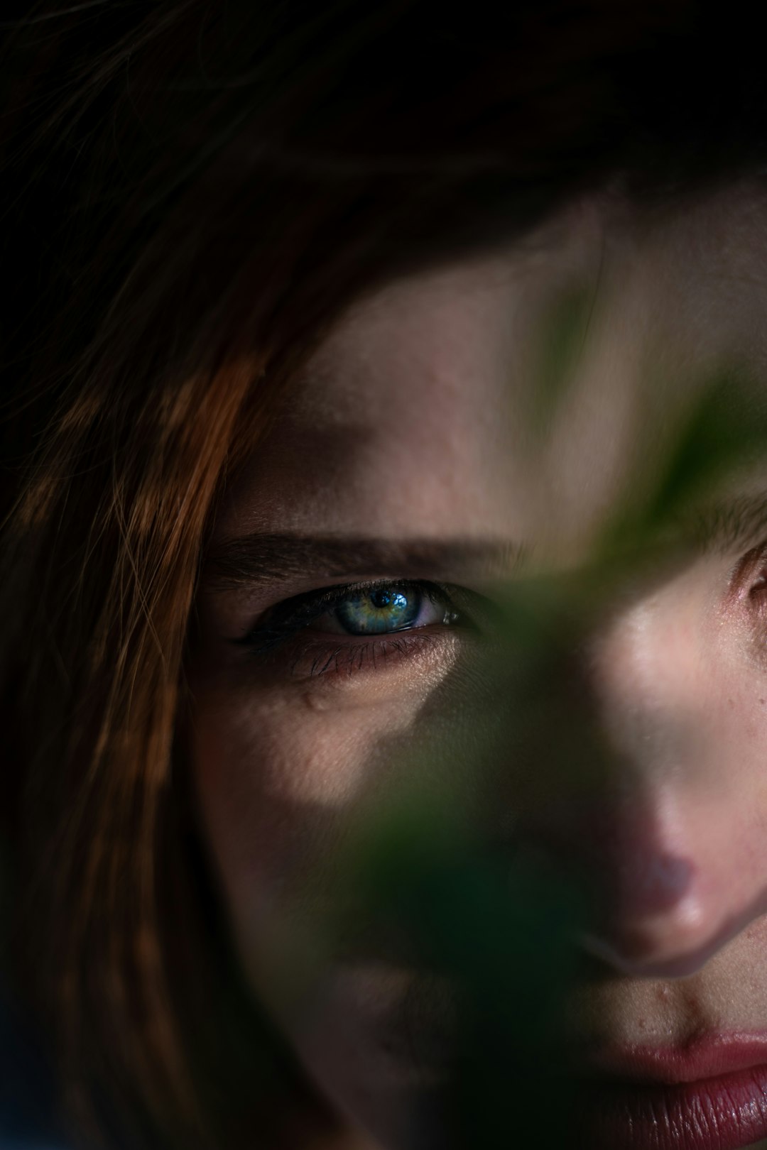 woman with blue eyes and brown hair