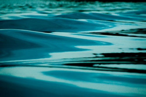 A close-up of calming soundwave patterns on a screen.