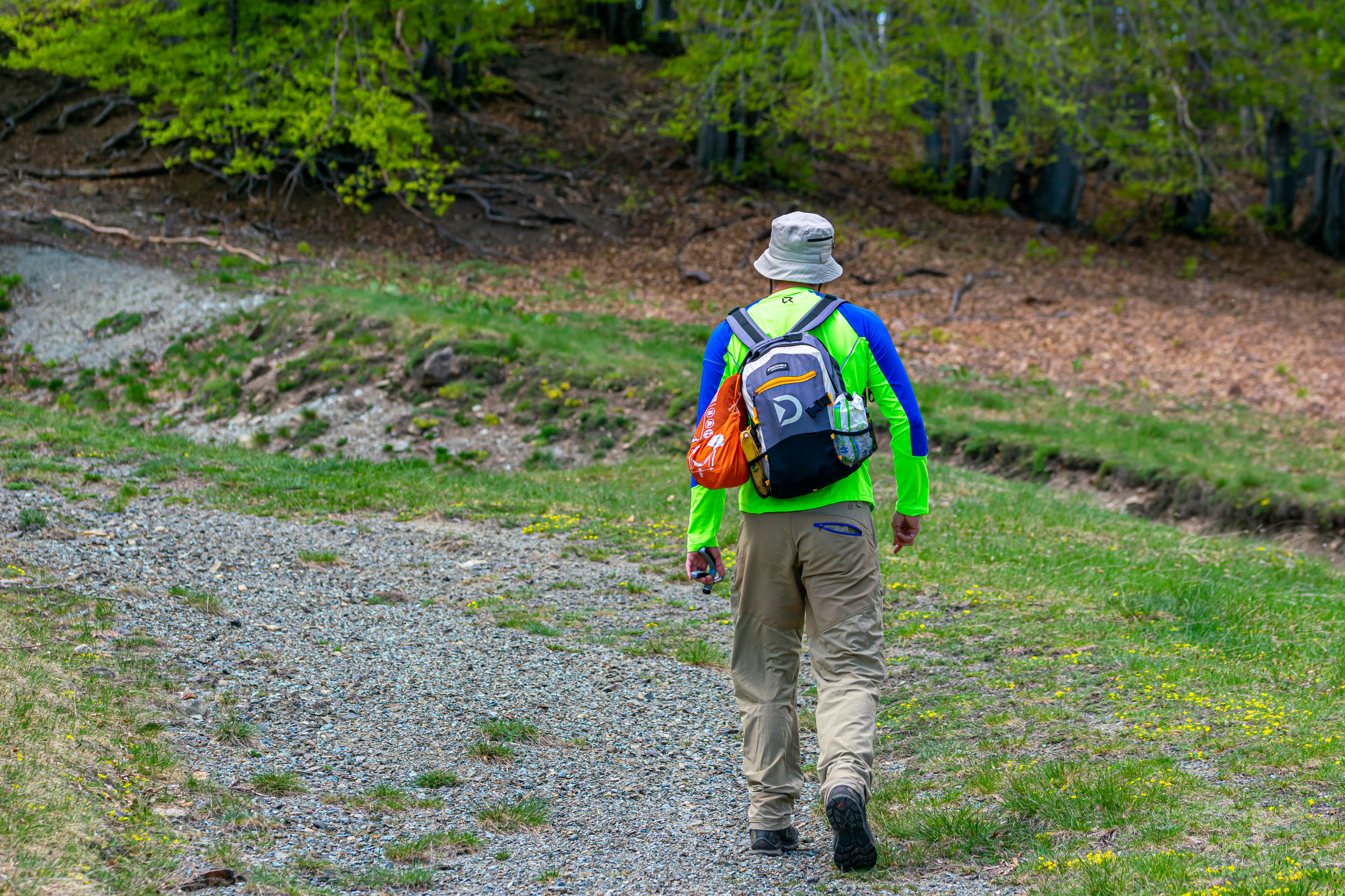Man walking on dirt road