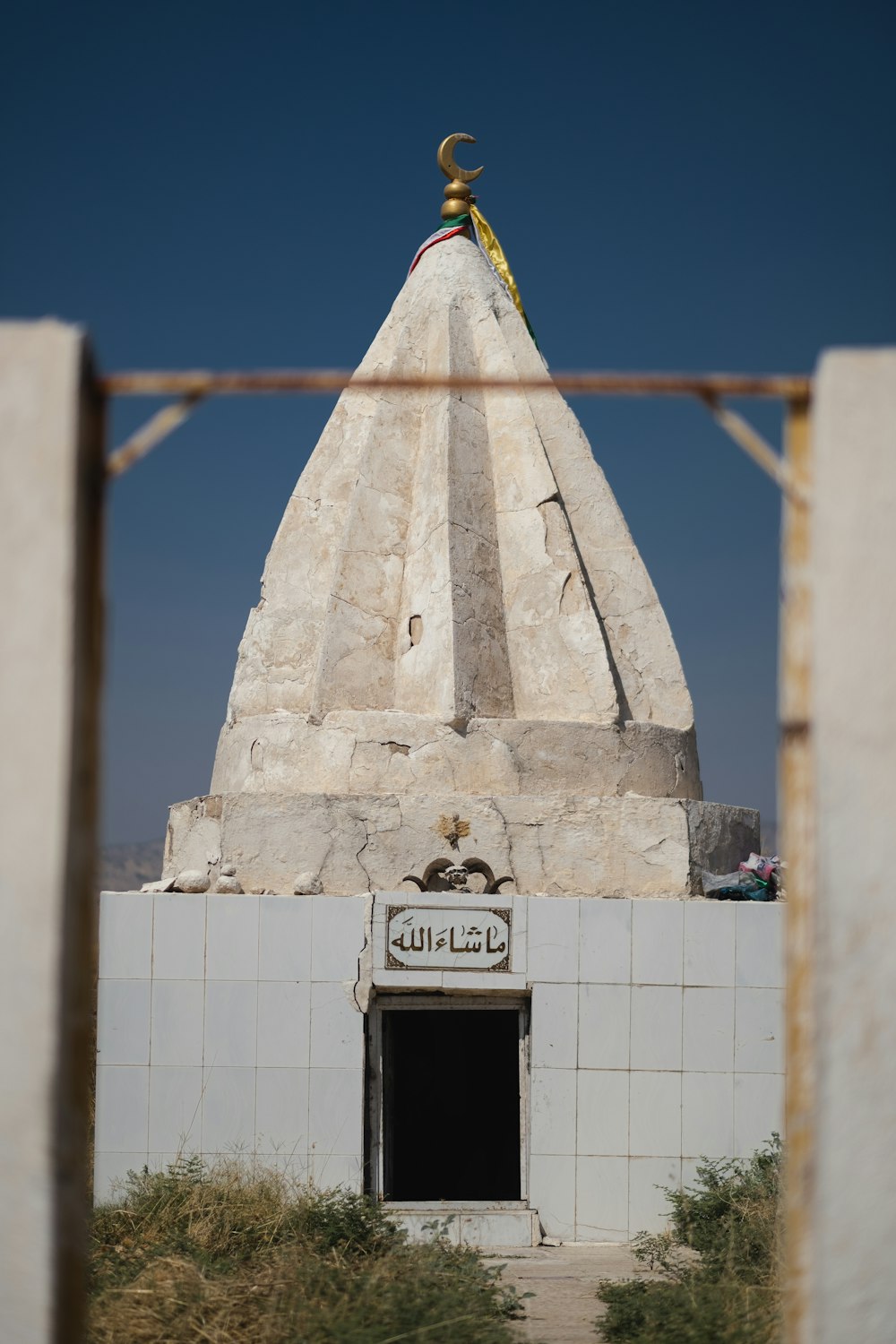 white and yellow concrete pyramid