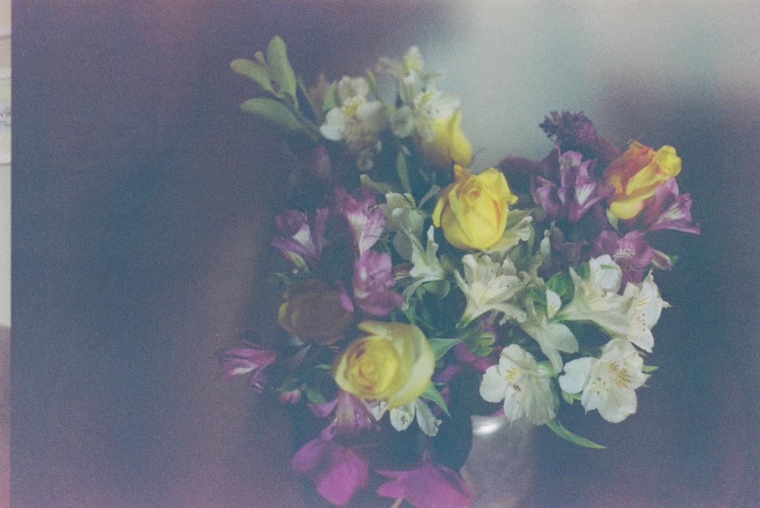 yellow and purple flower bouquet