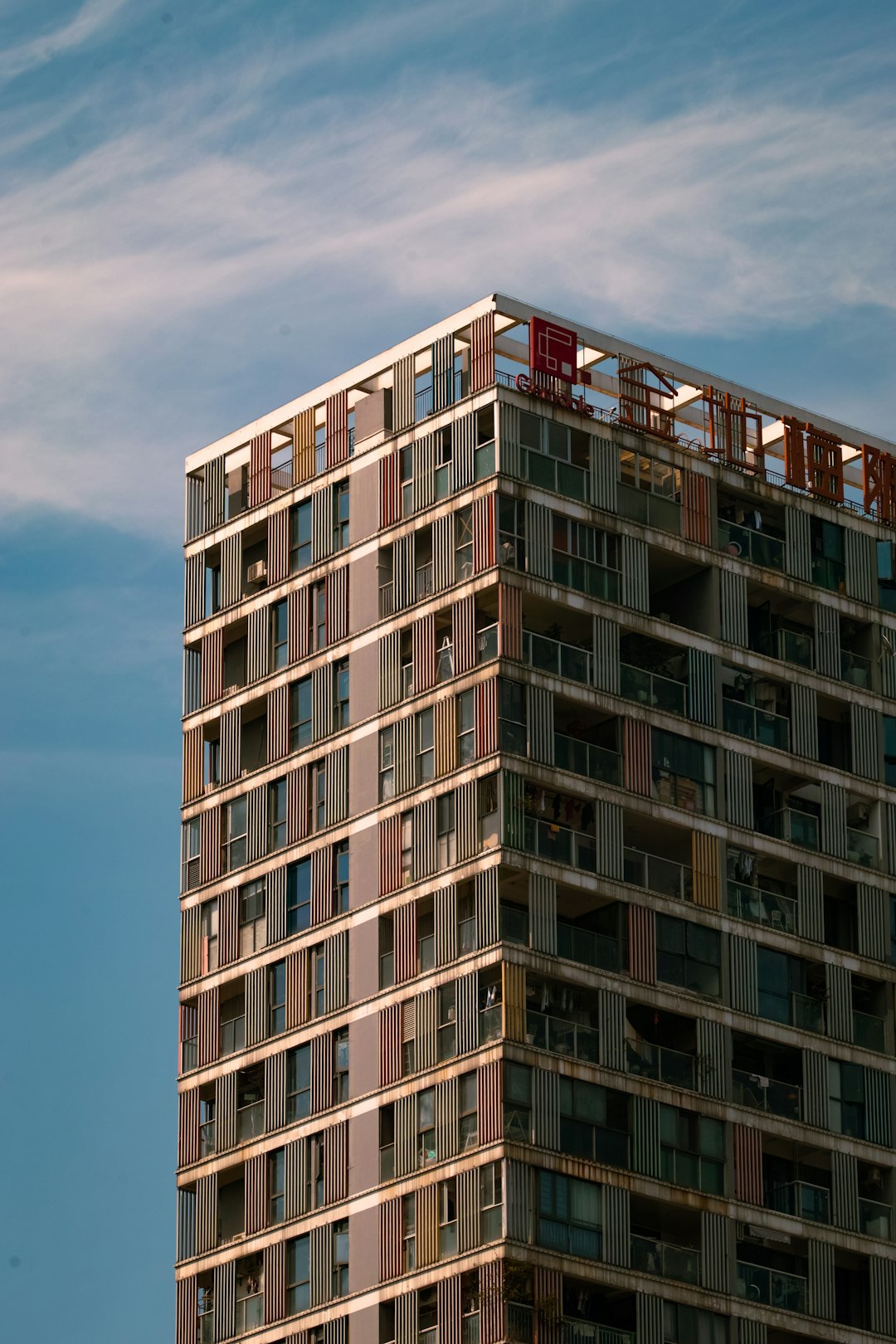 brown concrete building under blue sky during daytime