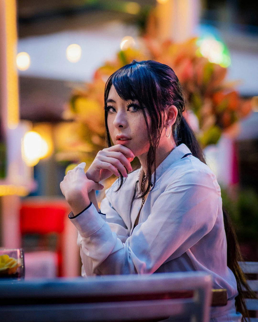 woman in white long sleeve shirt