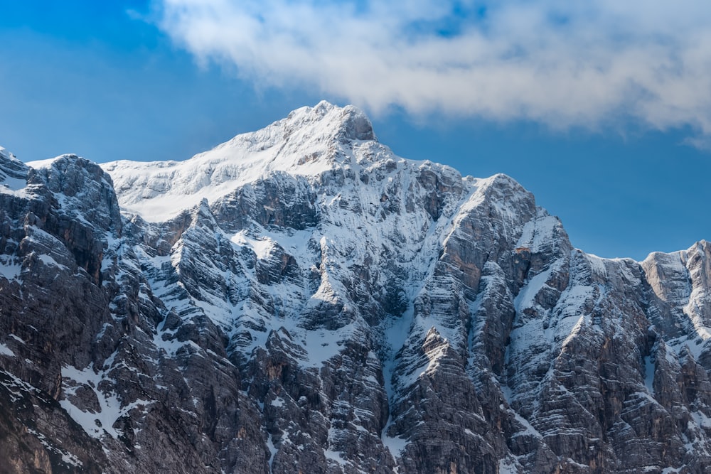 white and black mountain under blue sky during daytime