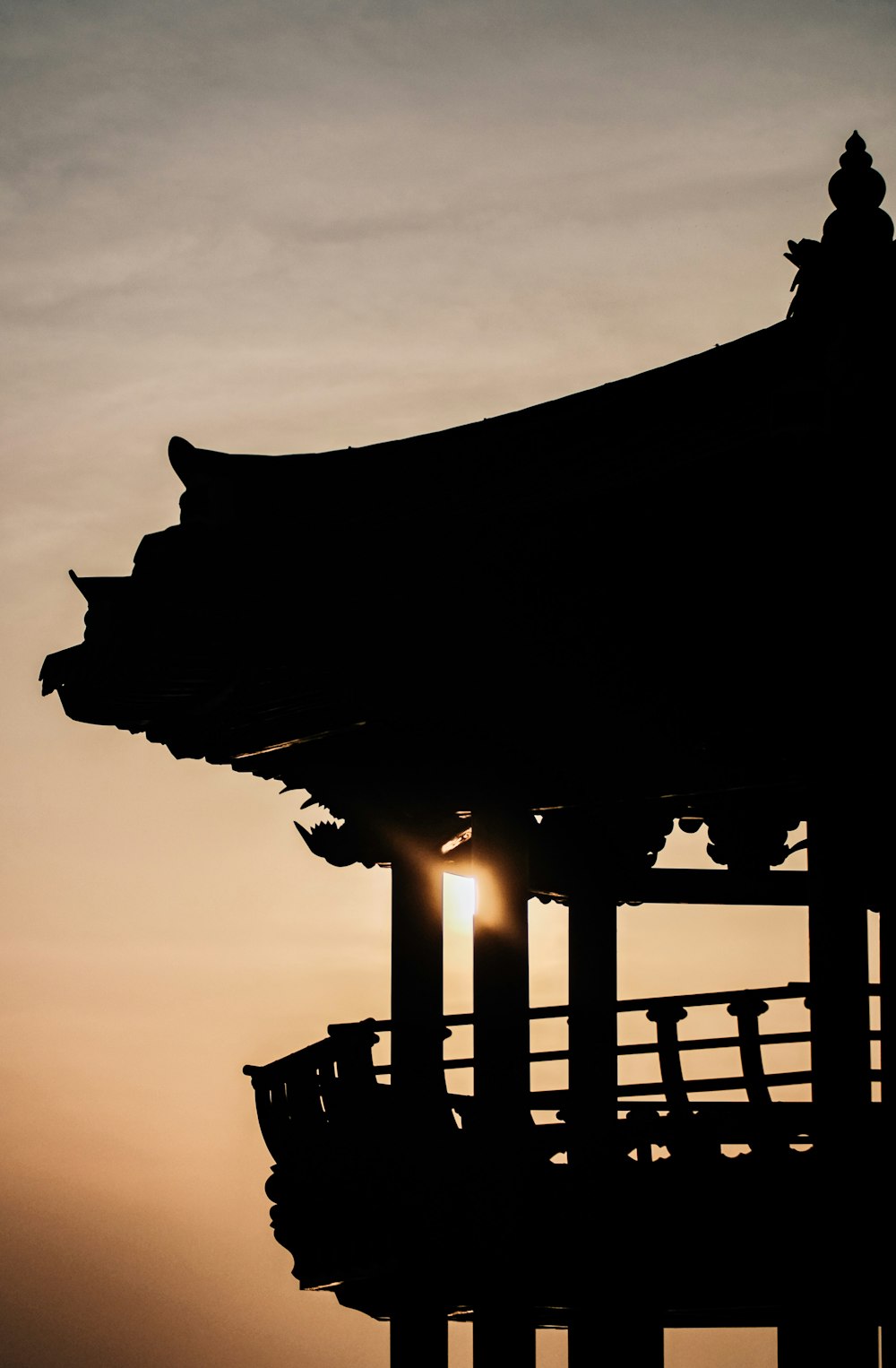 silhouette of building during sunset