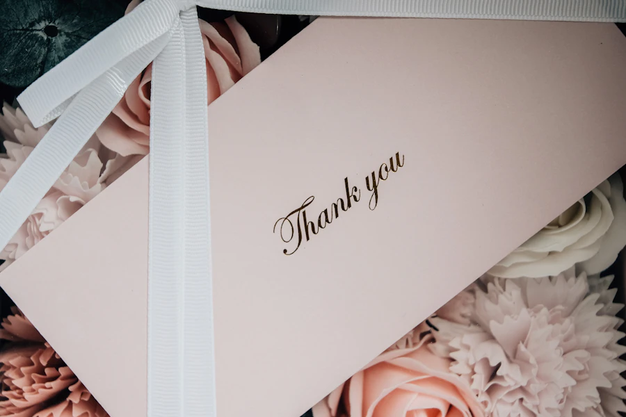White gift box with white ribbon