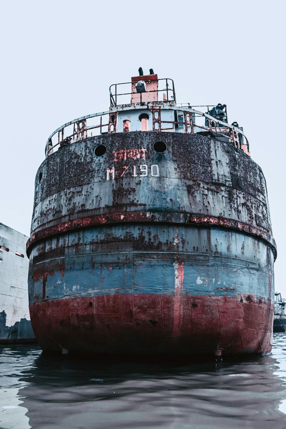 red and white ship on water