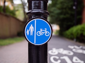 blue and black bicycle lane